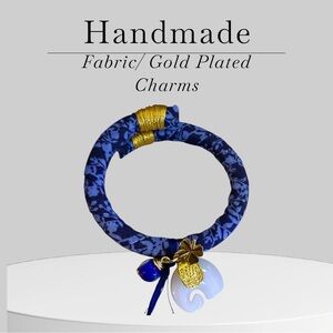 Blue and Gold Fabric Bracelet with Charms
